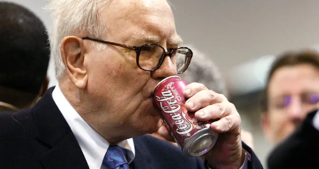 Warren Buffett tomando uma coca-cola